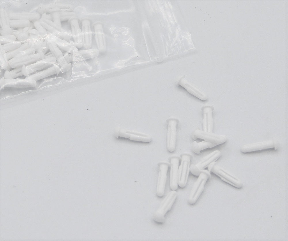 White plastic rivets
